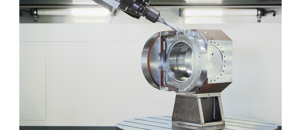 5-sides drilling and milling processing of an AXA spindle head body