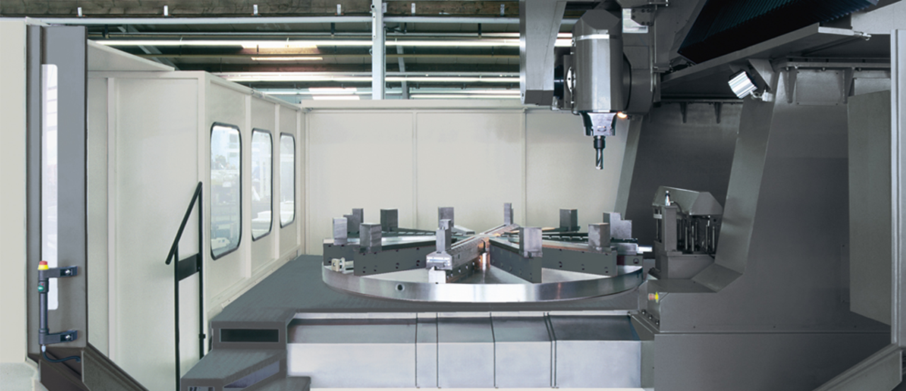 Ring machining with large gantry column machine combined with a rotary table
